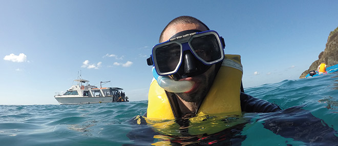 Snorkelling and taking a selfie on the Great Barrier Reef