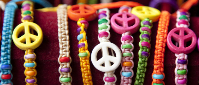 Peace sign bracelets for sale at a market