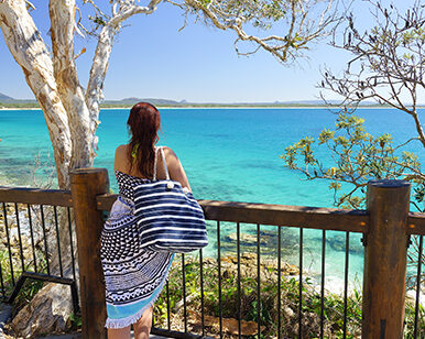 Lady on a Noosa Beach lookout.