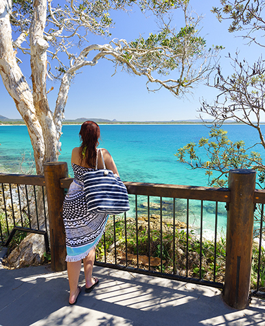 Lady on a Noosa Beach lookout.