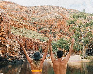 Happy couple at an outback water hole.