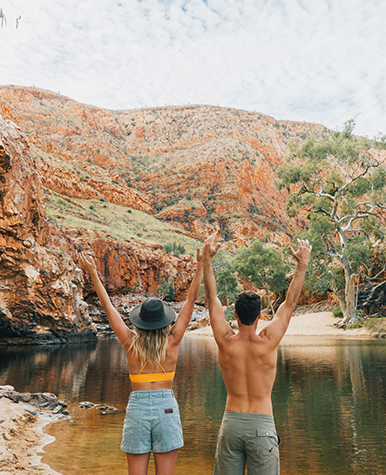 Happy couple at an outback water hole.